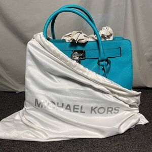 Michael Kors Teal Handbag with Silver accents and original Dust Bag